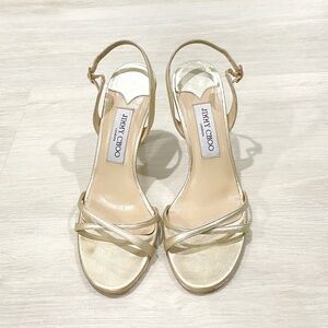 JIMMY CHOO: Champagne gold 'Jasmin' strappy, slip-on, stiletto sandal. Size 37.5